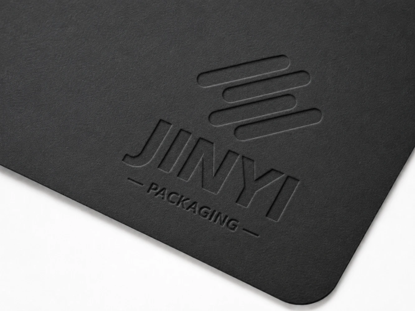Blind debossing — recessed motif for tactile brand impression on packaging