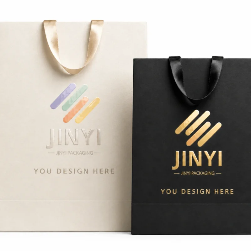 Custom gift bags in white and black kraft paper with cotton rope handles — JINYI