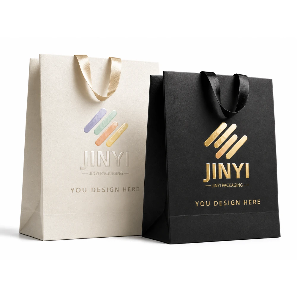 Custom gift bags in white and black kraft paper with ribbon handles — JINYI