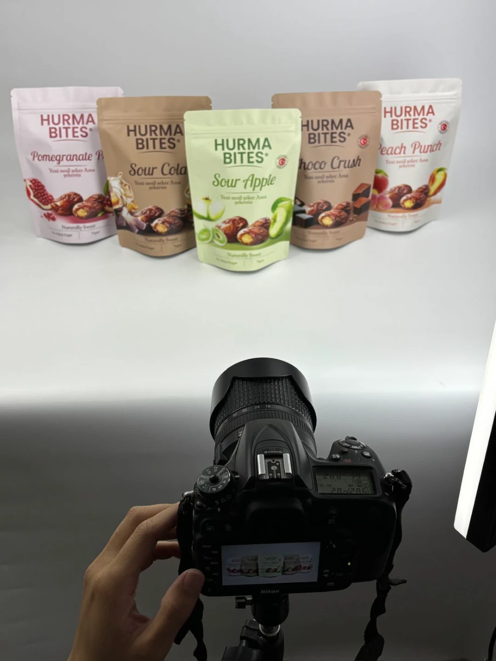 JINYI in-house product photography service — custom flexible packaging bags professionally photographed for commercial use included with every order