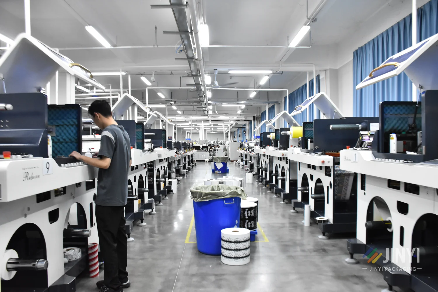 JINYI die-cutting department with 30 die-cutting machines for custom flexible packaging labels stickers and specialty print products