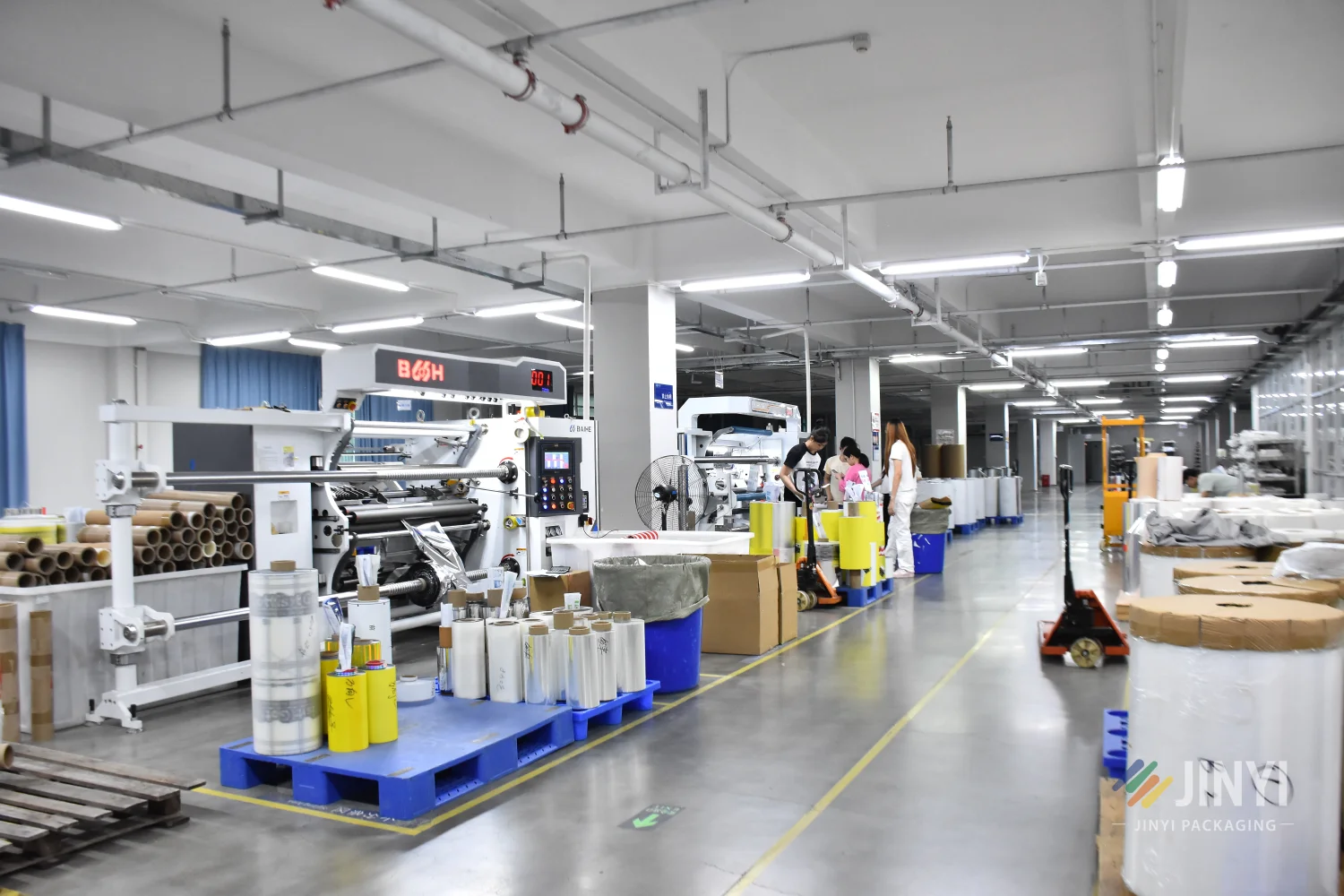 Raw flexible packaging film material rolls at JINYI factory — PET AL PE laminate and film structures for custom pouch production