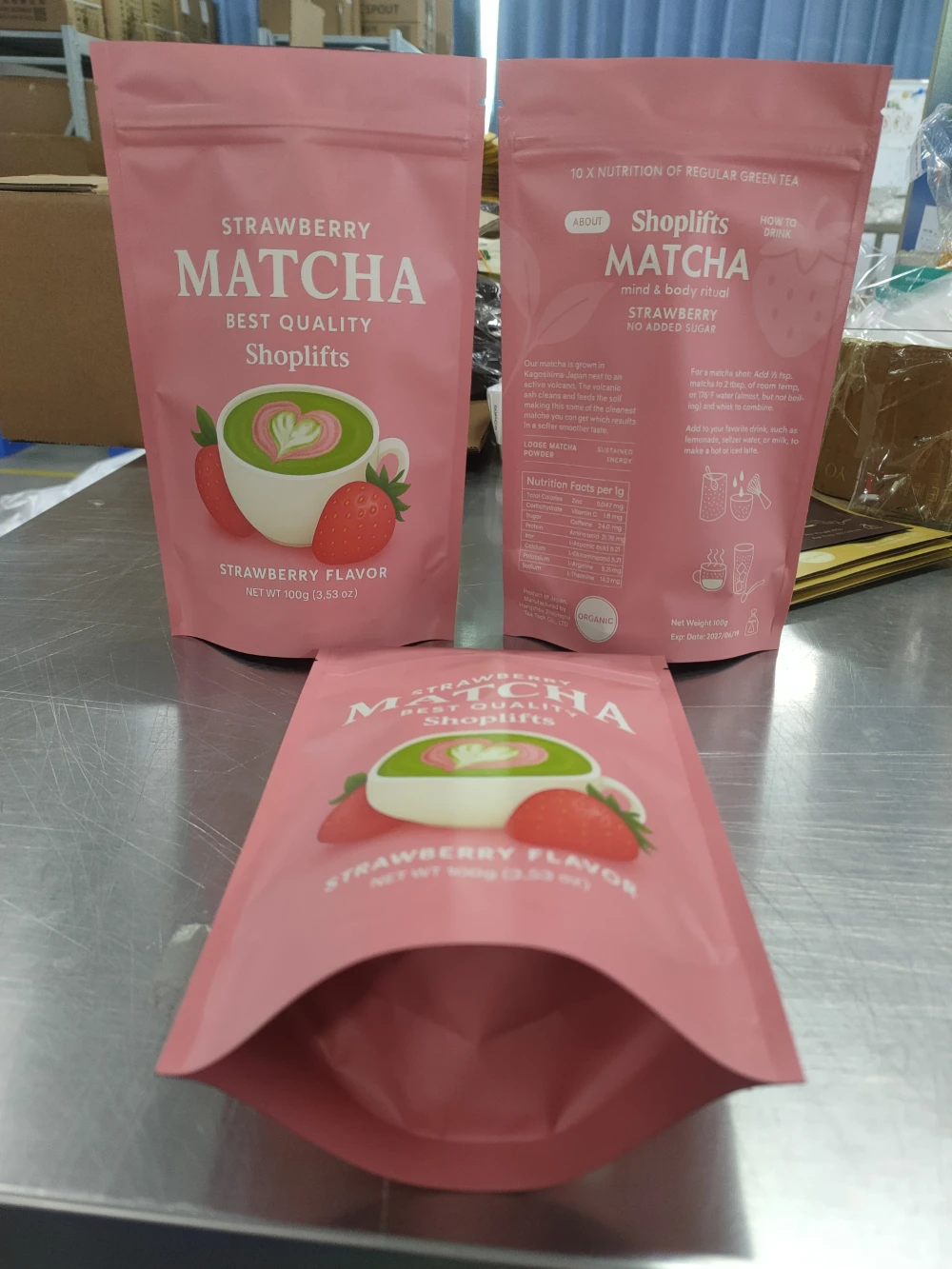 JINYI custom pink strawberry matcha stand-up pouches in matte finish — multi-SKU matcha packaging factory-direct