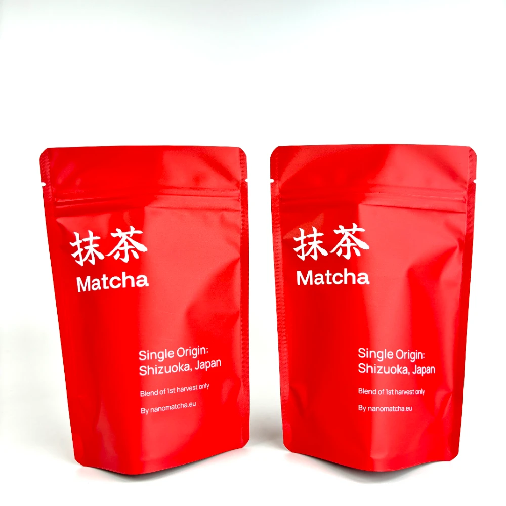 JINYI custom red matte matcha stand-up pouches with Chinese and English branding — factory-direct flexible packaging