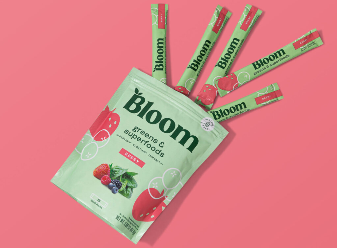 Bloom Nutrition single-serve stick pack pillow bag format — back-seal pouch packaging for portable supplement sticks in pink brand colourway