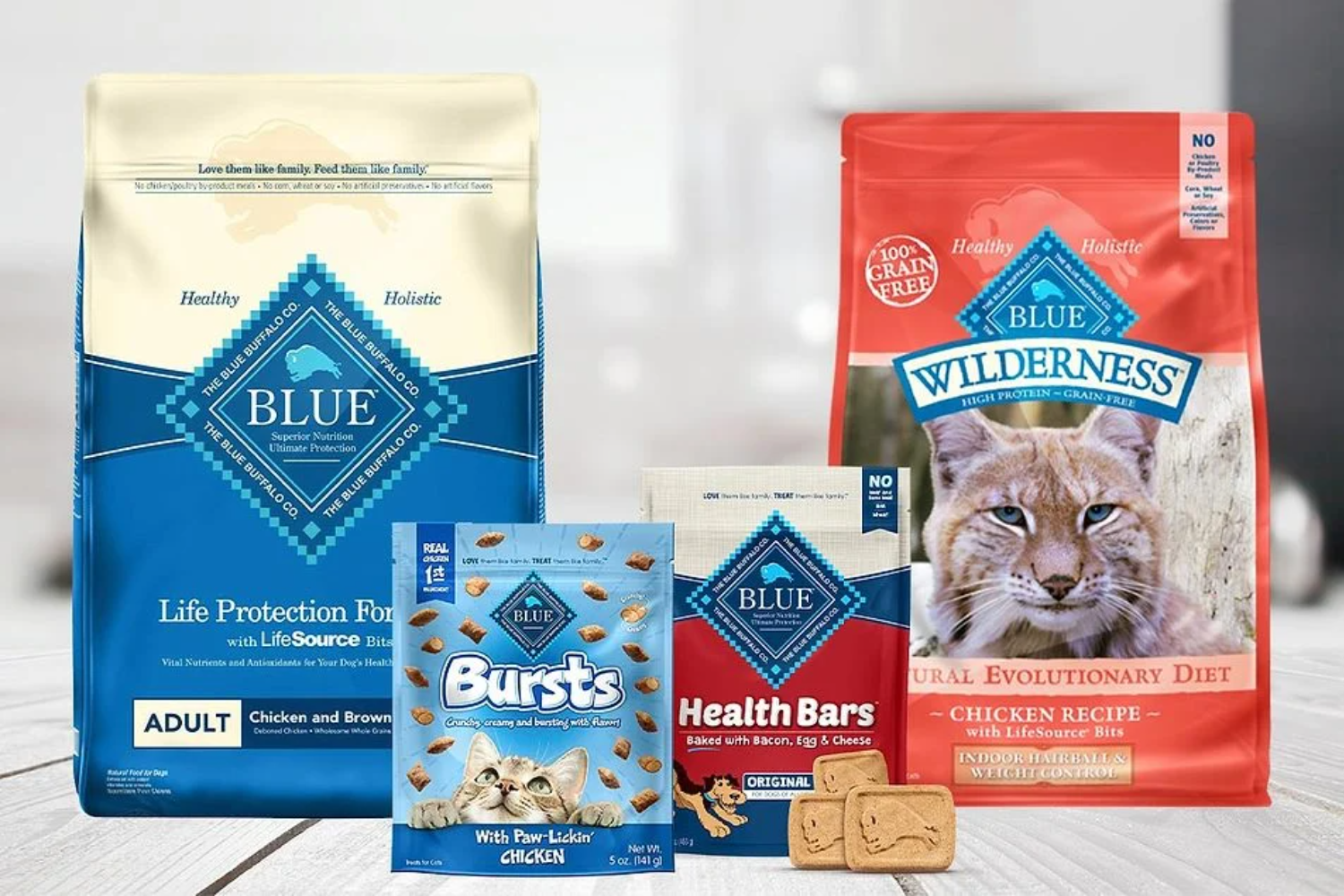 Blue Buffalo dog and cat food flexible packaging range — multiple product lines showing high-saturation full-colour print across dry food bag formats