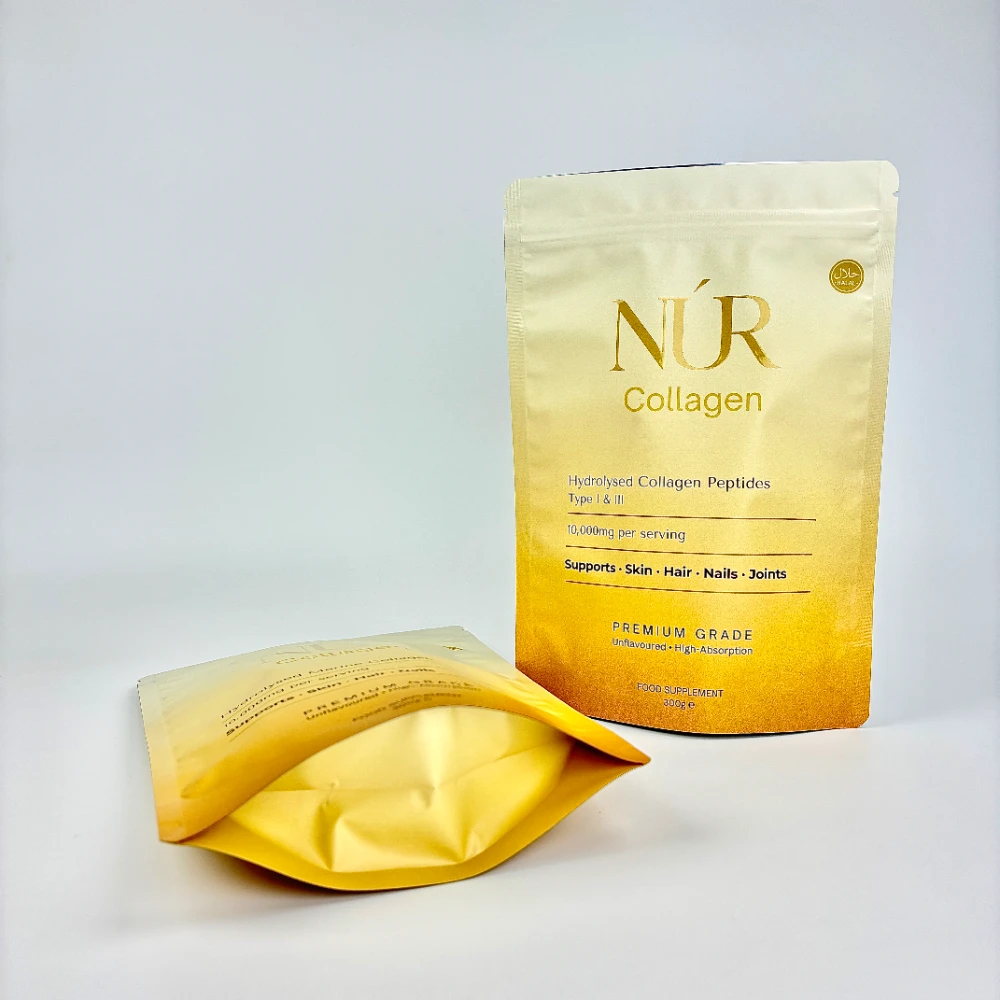 JINYI custom supplement stand-up pouches for NUR Collagen brand — gold gradient flexible packaging showing front view and base gusset detail, factory-direct production