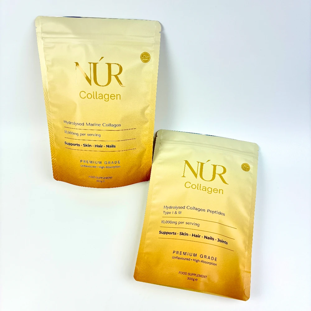 JINYI custom supplement stand-up pouches with gold gradient print — factory-direct flexible packaging for women's wellness and nutrition brands from 500 units