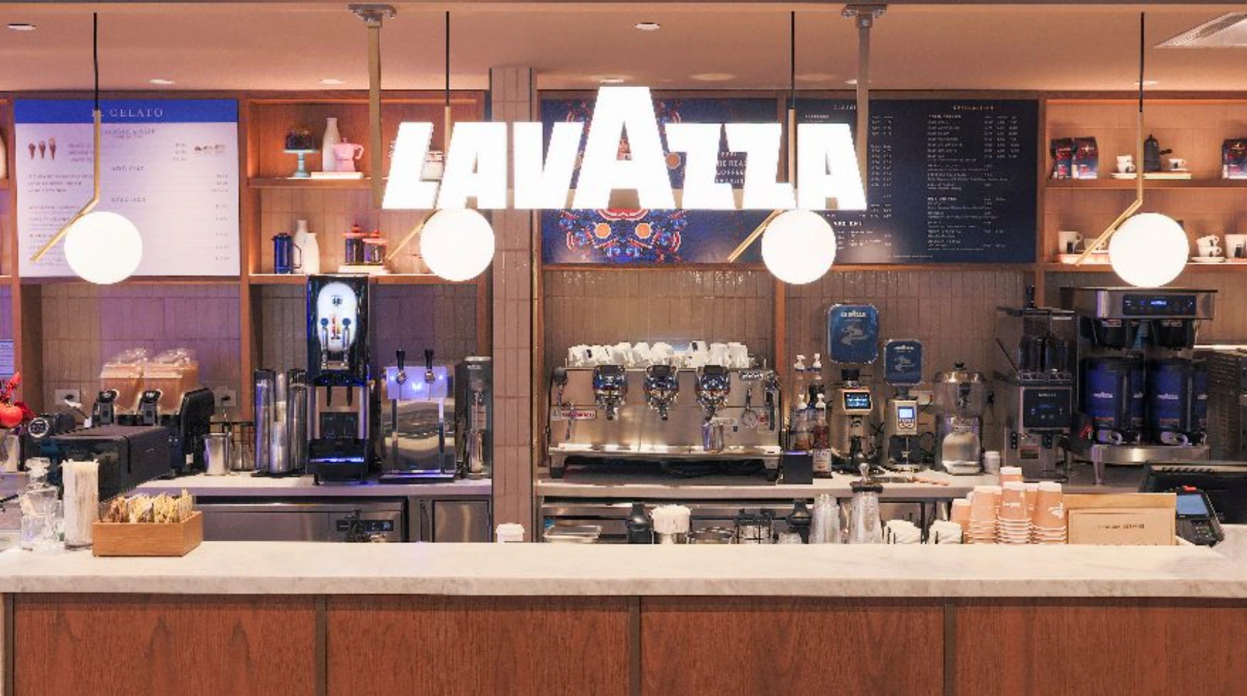 Lavazza coffee brand store inside Eataly retail environment — Italian coffee brand global retail presence across 140 countries