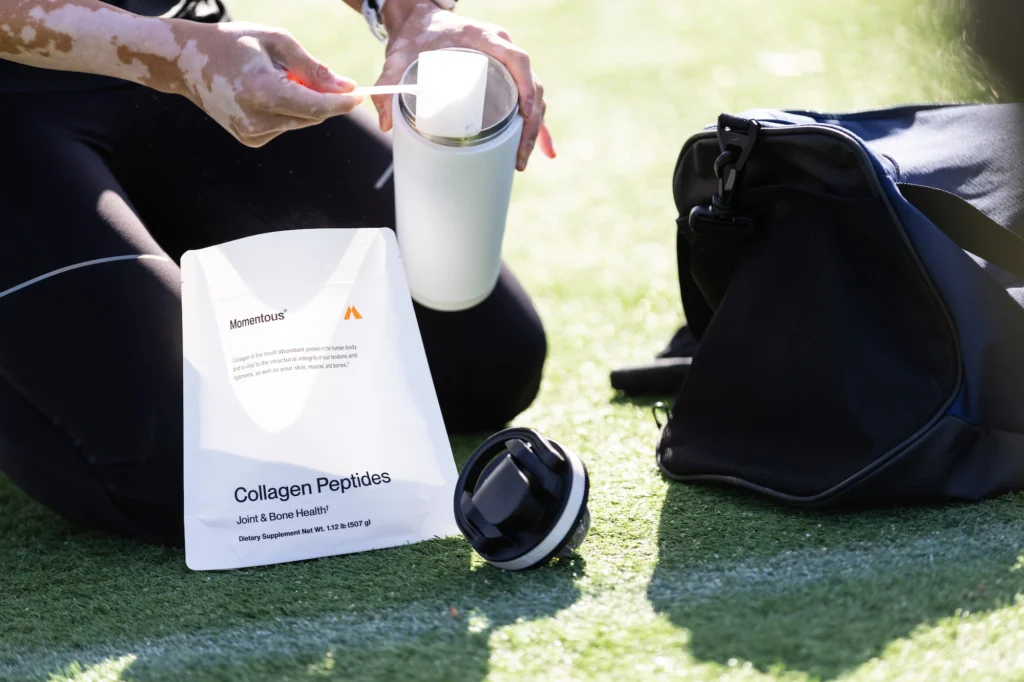 Momentous Collagen Peptides stand-up pouch in athletic lifestyle context — supplement packaging for active performance
