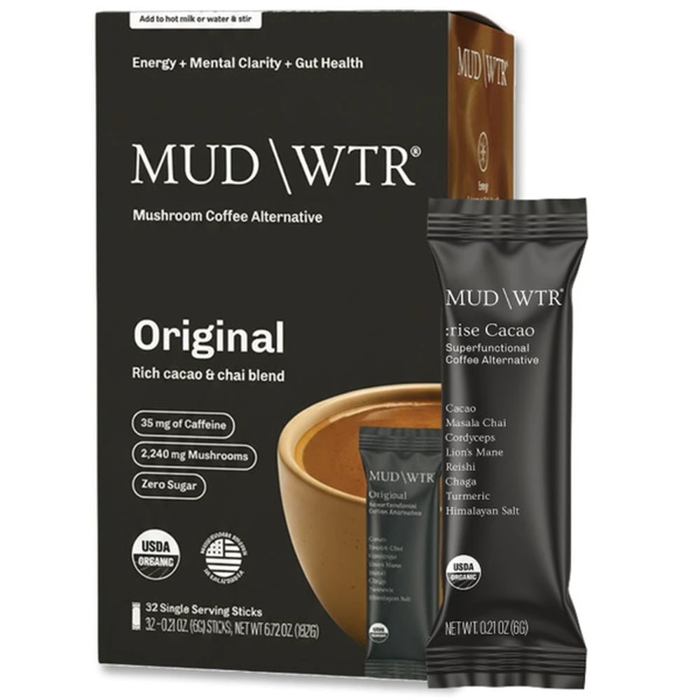 MUD\WTR DTC unboxing — aluminum tin packaging with branded shipping box and product information cards