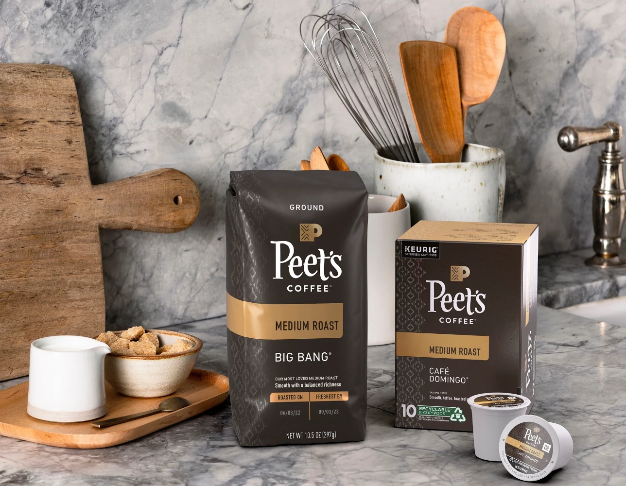Peet's Coffee dark packaging in lifestyle setting — specialty coffee stand-up pouch showing brand design language and roast-forward positioning