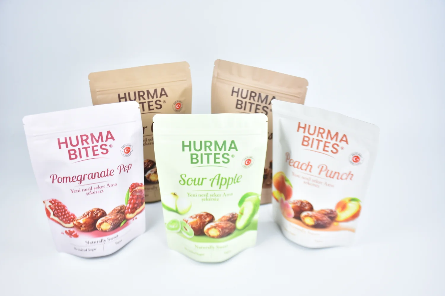 Hurma Bites flavored date candy stand-up pouches in multiple colors produced by JINYI packaging factory