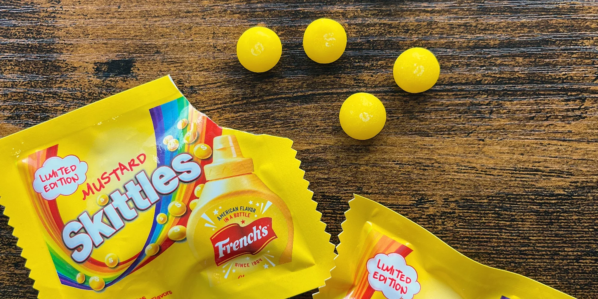 Skittles Fruities small single-serve bag displayed on a wooden surface