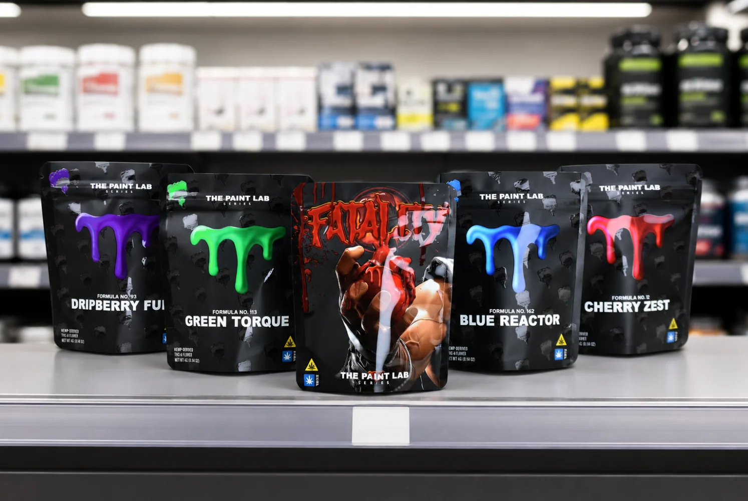 The Paint Lab custom retail packaging set on supermarket shelf — multi-SKU stand-up pouches produced by JINYI