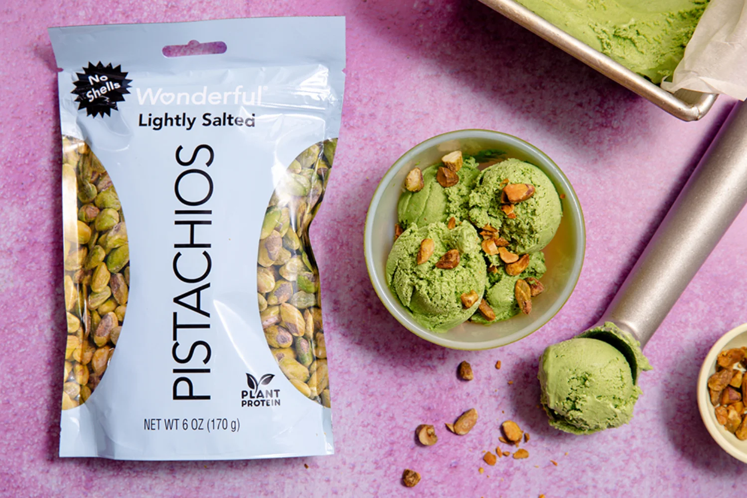 Wonderful Pistachios Lightly Salted bag styled with pistachio ice cream on purple background